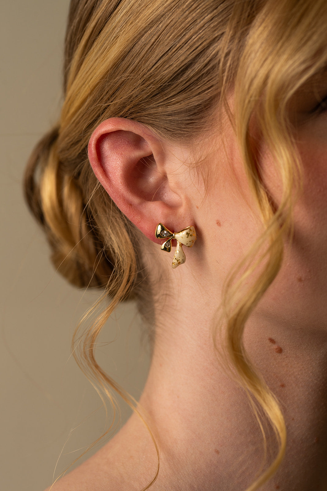 White and Gold Bow Stud Earrings