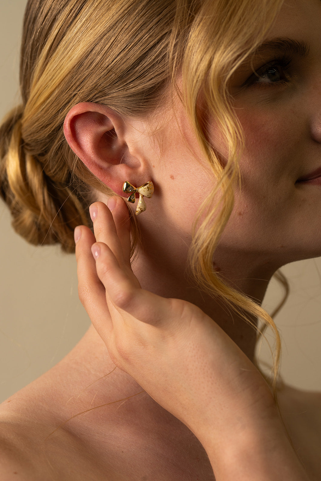 White and Gold Bow Stud Earrings