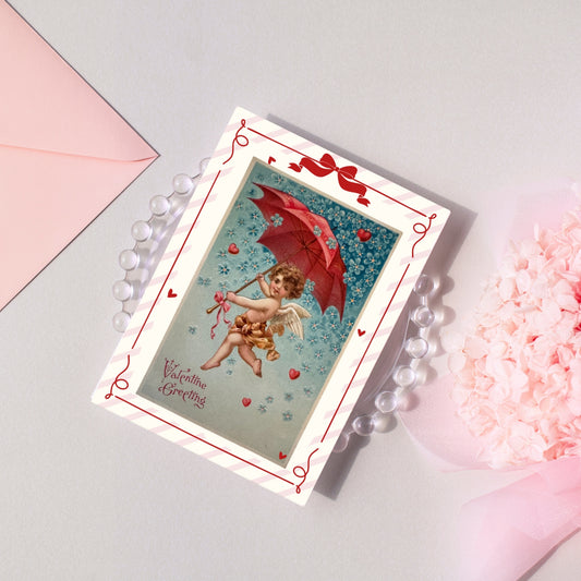 Valentine's Day card with Cupid and red heart design on a light gray background